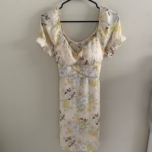 This is a madden NYC dress, it is a size medium, and it’s multicolor.